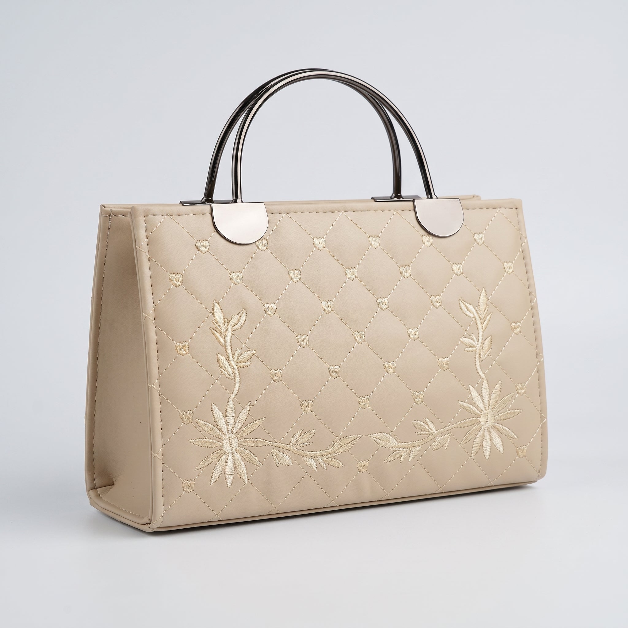 Quilted embroided Handbag